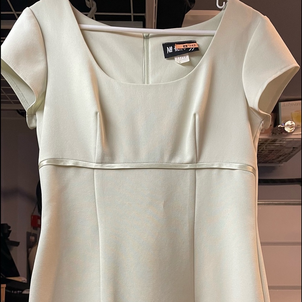 All That Jazz dress with 3/4 zip back. Size 11/12. Dry cleaned